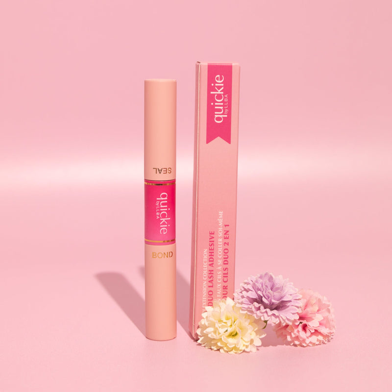 DIY Lash Extension - 2-in-1 Duo Lash Adhesive product standing next to its packaging, on a pink background.
