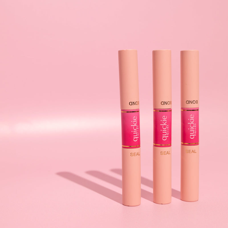 3 of DIY Lash Extension - 2-in-1 Duo Lash Adhesive products standing next to each other on a pink background 