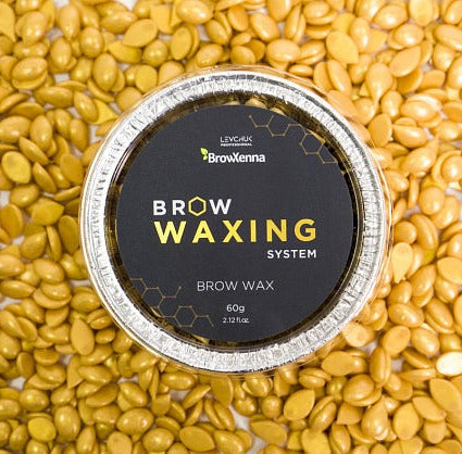 Facial hair removal wax pack with wax beads displayed on a background