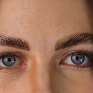 Laminated brows after nourishing serum treatment.