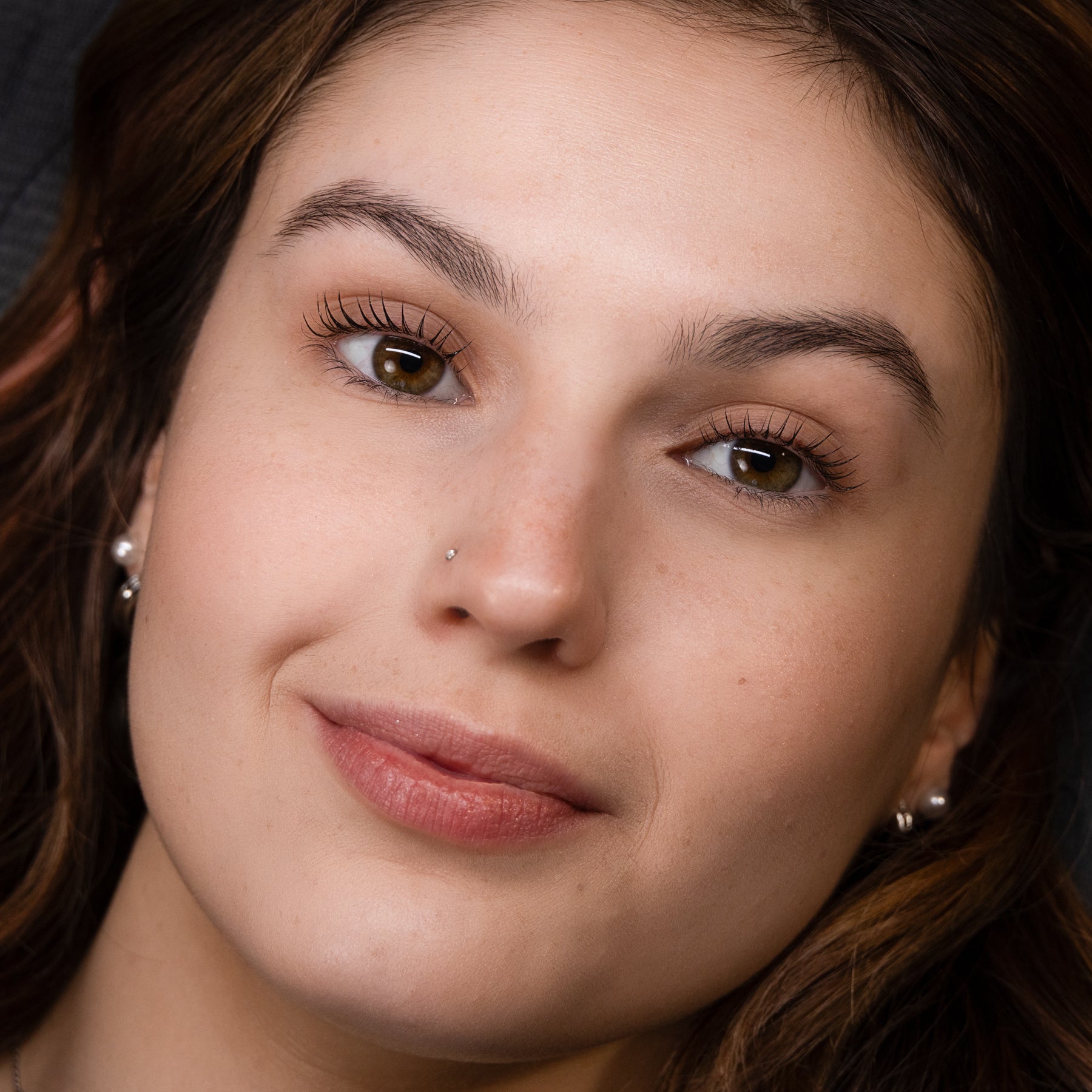 Lashes after nourishing serum treatment.