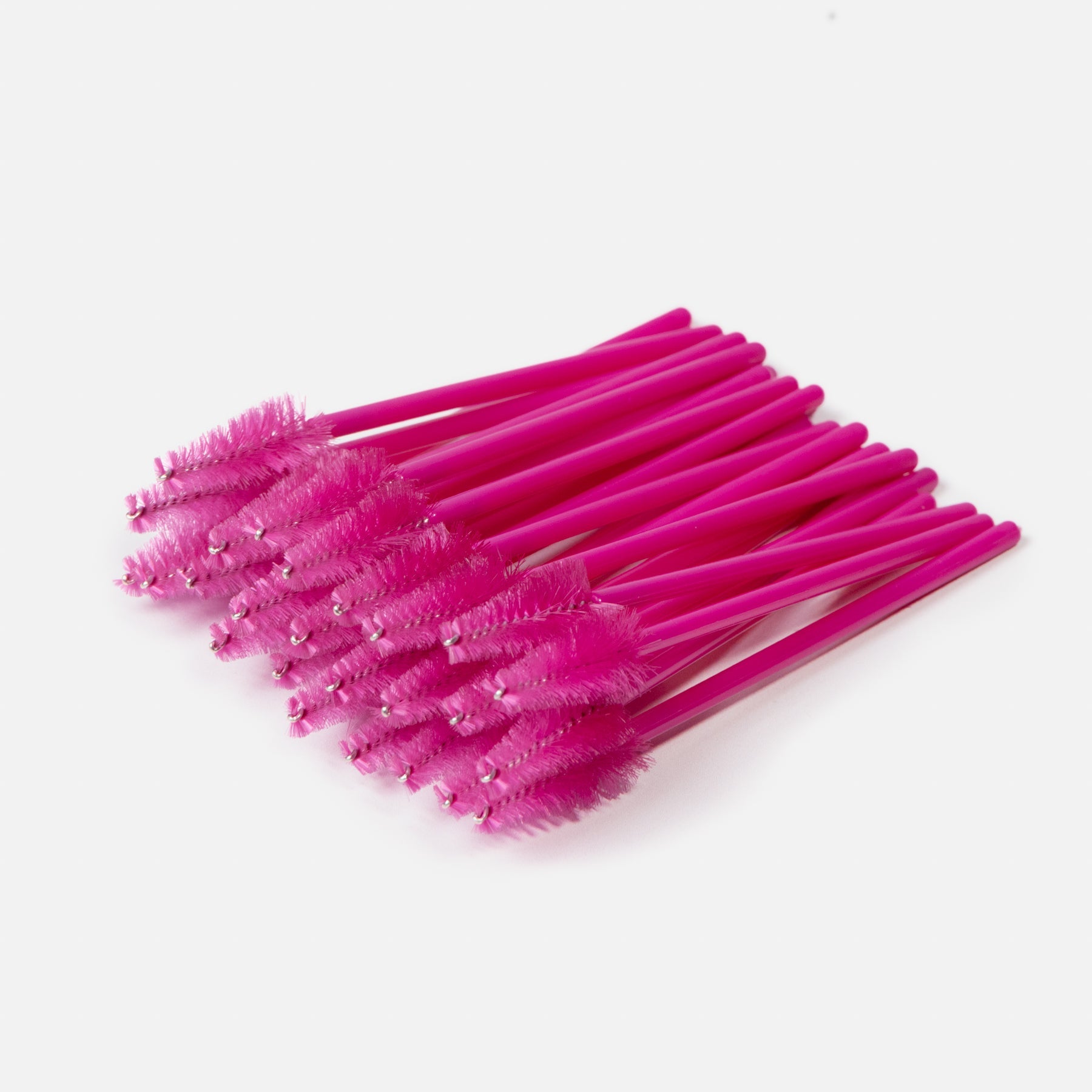 Brosse mascara rose en forme de goutte