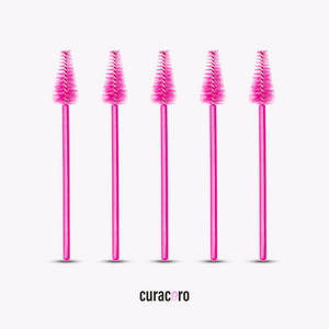 Brosse mascara rose en forme de goutte