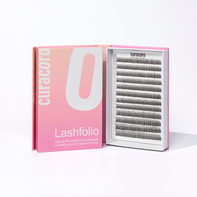 Curacoro Lashfolio with narrow promade fan collection and open tray of lash extensions on a white background.