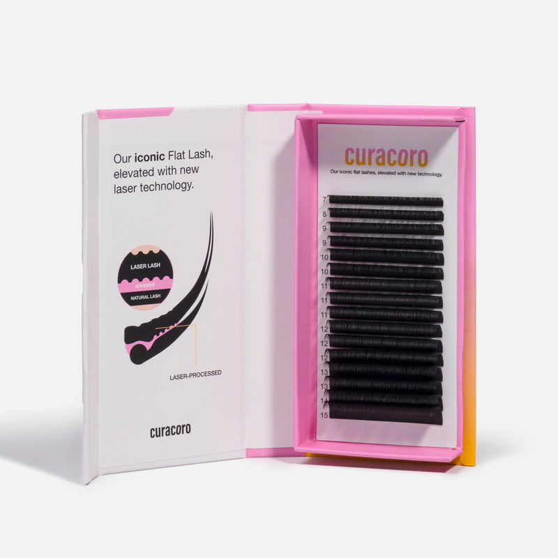 Curacoro Laser Flat Lash tray in pink and white packaging, open to reveal black eyelash extensions with product details.