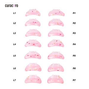Curacoro Kitty Kinks lash lift shields in pink with star and moon designs, available in sizes L1 to R7 for precise lash lifting.