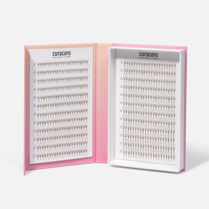 Curacoro Lashfolio Dark Brown individual lash extensions in a dual-sided pink gradient box.