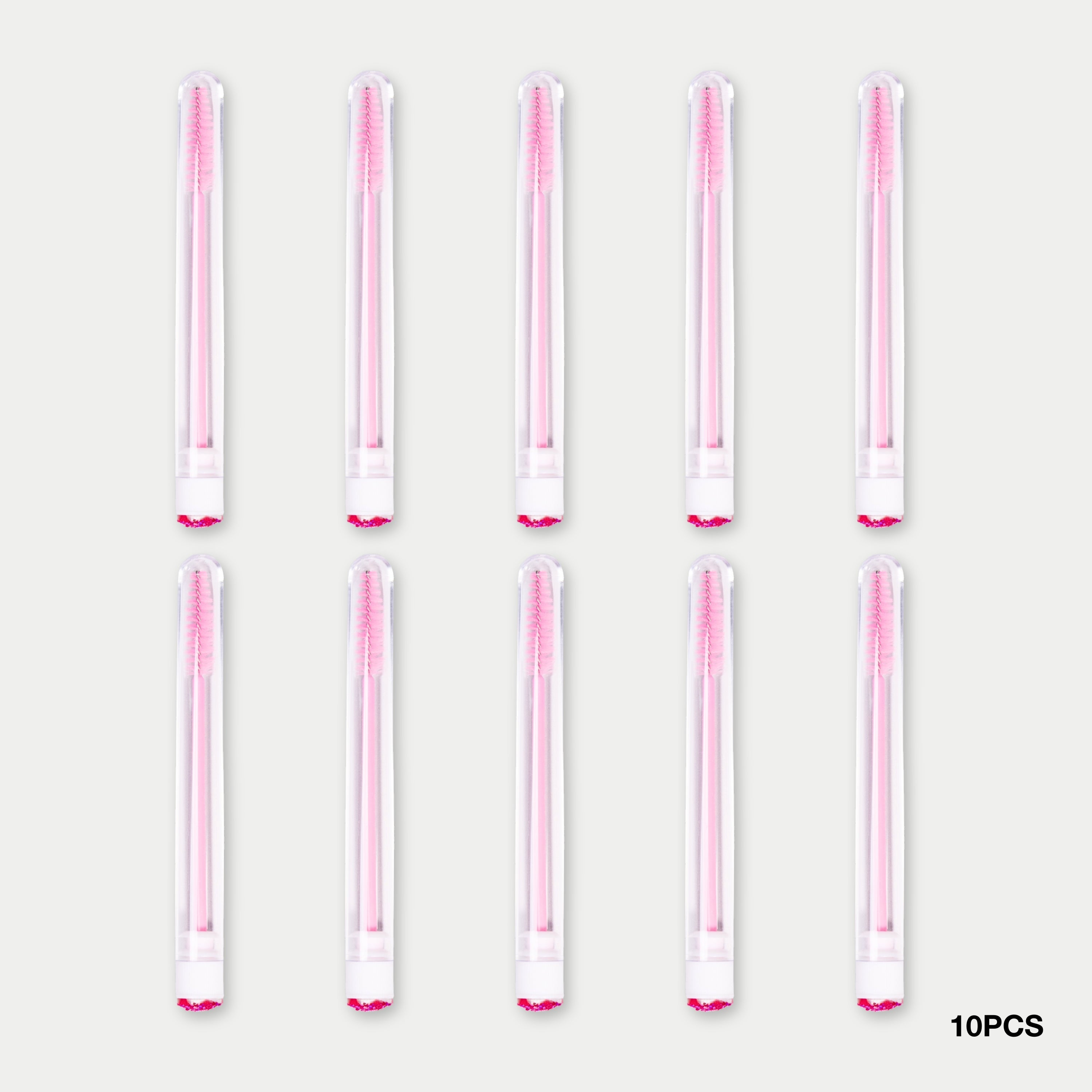 10 pcs Mascara Brushes with Tubes over a light background . 