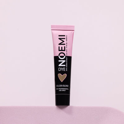 Noemi Hybrid Brow & Lash Dye - Golden Blond Bottle Over Pink Background