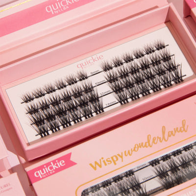 Close-up of DIY lash extension set in pink packaging, by Quickie, featuring lash lengths which are 8mm, 10mm, 12mm, and 14mm for dramatic volume.