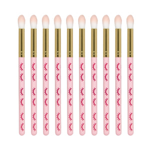 Extended wooden cleansing brush (pack of 10) colour pink, over white background. 