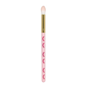 Extended wooden cleansing brush colour pink in front of a white background.