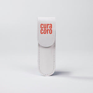 Gold Eyebrow Scissors orange case.