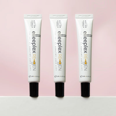 Three tubes of Healthy Lash Lift products displayed on a pink background