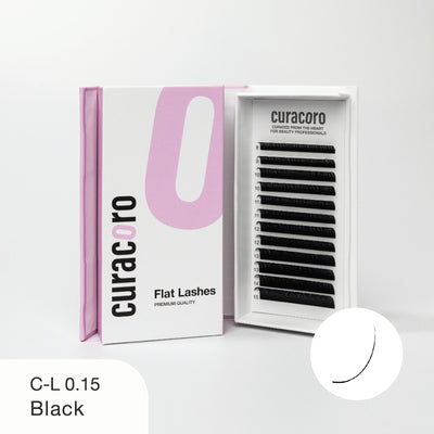 Curacoro Flat Lashes in black, style C-L 0.15, displayed with its open box showing neatly arranged lashes on a white background.