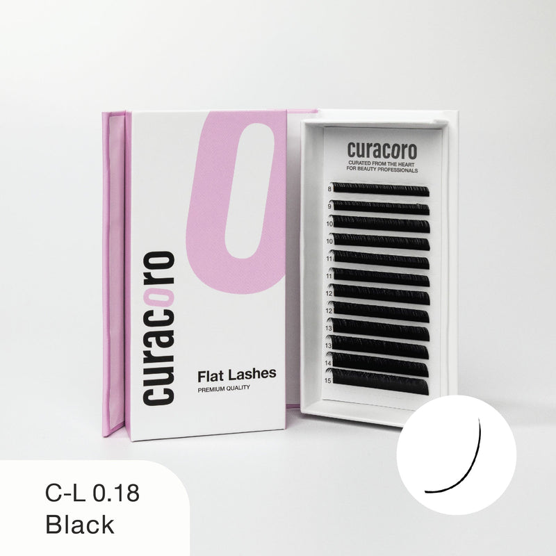 Curacoro Flat Lashes in black, style C-L 0.18, displayed with its open box showing neatly arranged lashes on a white background.