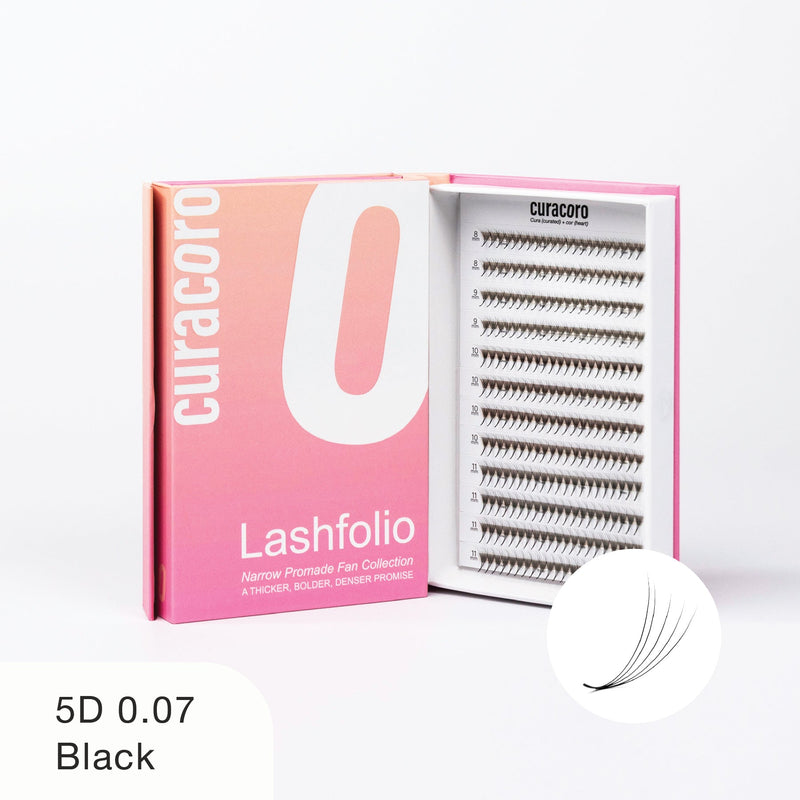 Curacoro Lashfolio 5D 0.07 Black lashes in pink gradient packaging with open tray showcasing lightweight, voluminous lash fans.