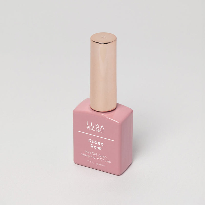 LLBA Rodeo Rose Gel Polish bottle with a pink design and gold cap on a light background.