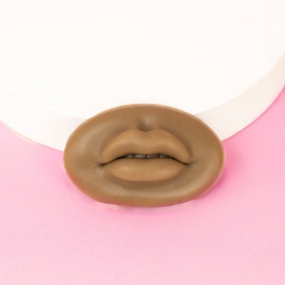 Dark style of 3D Silicone Lips standing in front of a pink background.