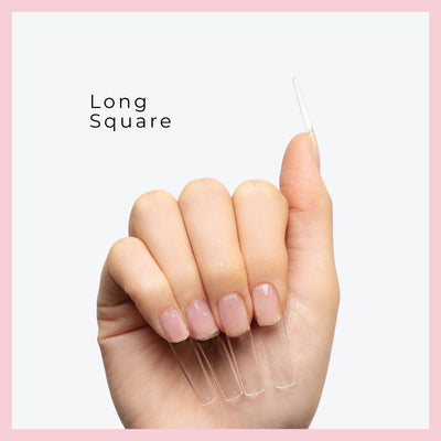 long nail tips displayed on fingers with a clean, pink-bordered background.