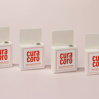 Four Curacoro Brow Mapping String Boxes Over a light pink Background