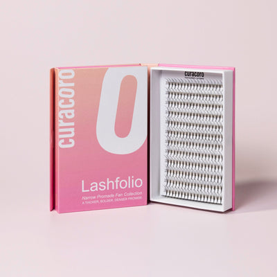 Lashfolio Double Spike standing in front of a pink background with an open case.