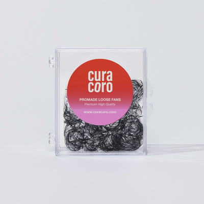 A clear box of Curacoro Promade Loose Fans with premium quality lash extensions.