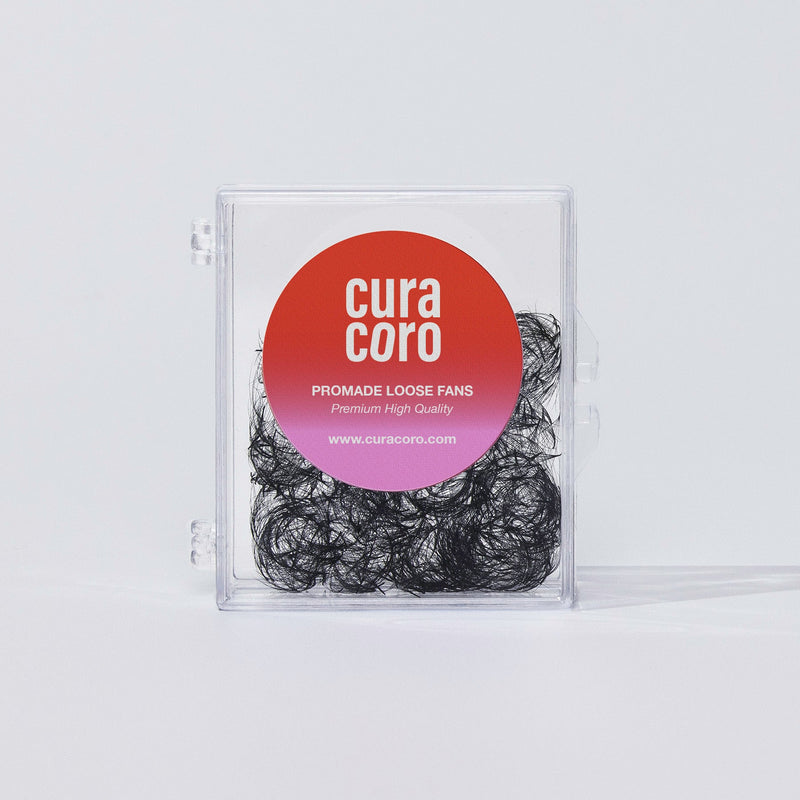 A clear box of Curacoro Promade Loose Fans with premium quality lash extensions.