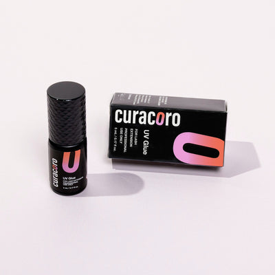 Curacoro UV glue bottle next to the product box on a light background.