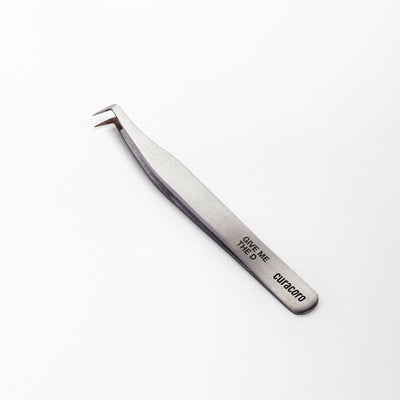 Give Me The D Tweezer Silver over a light background. 