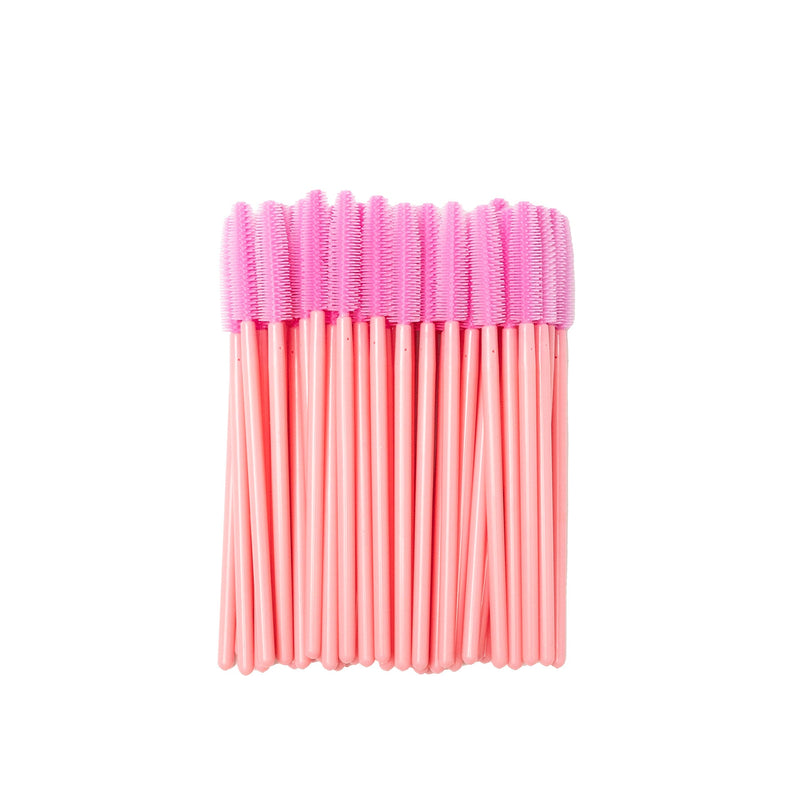 Image of disposable pink silicon brush wands for eyelashes and brows in a white background.